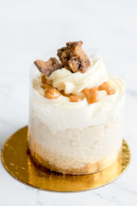 Mini cheesecake topped with frosting and nuts as made famous by Sweets by Diane in Roseville, Minnesota.