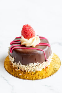 Mini chocolate cake topped with strawberry frosting as made famous by Sweets by Diane in Roseville, Minnesota.