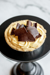 Mini pie topped with frosting and chocolate chips as made famous by Sweets by Diane in Roseville, Minnesota.