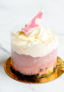 Mini strawberry cheesecake topped with frosting as made famous by Sweets by Diane in Roseville, Minnesota.jpg