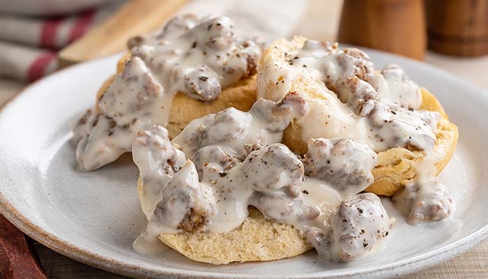 Plate of Roseville Minnesota's best breakfast biscuits and gravy served at Sweet & Savory By Diane in POTLUCK Food Hall in Rosedale Center.